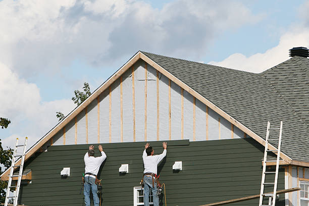 Professional Siding Installation technician working in Banco, VA